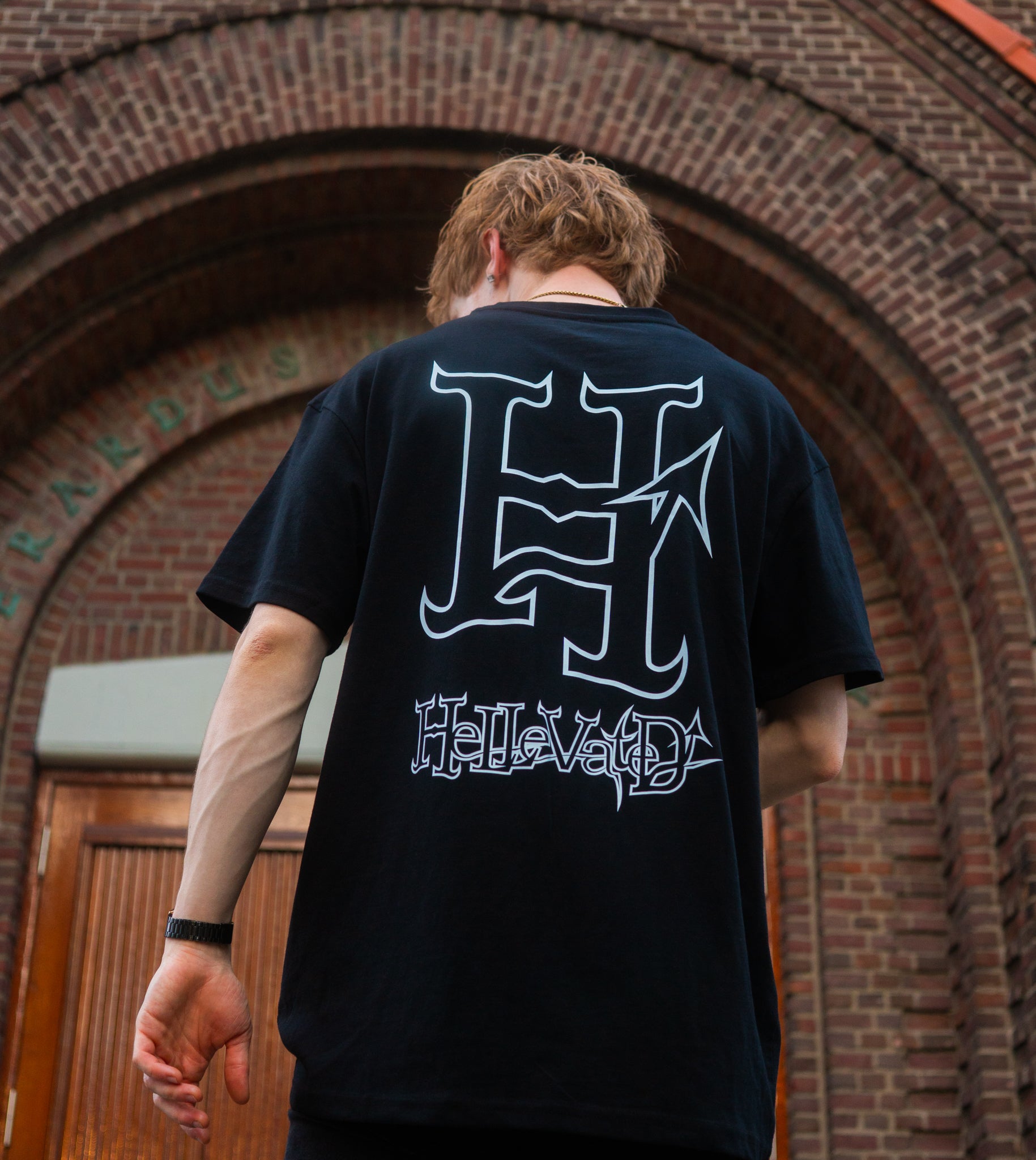 Model with H for Hellevated T-shirt